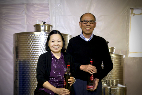 "Mom and Dad": Proud distillers Kim Trinh & Phan Ly at Vinn Distillery in Portland, Oregon