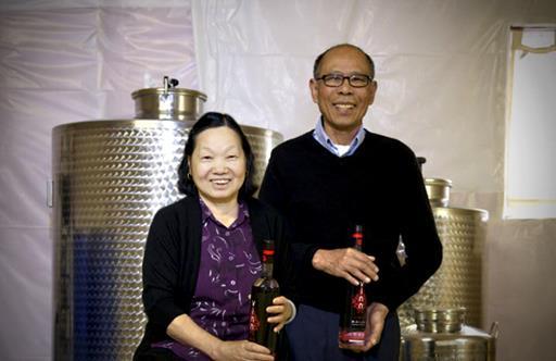"Mom and Dad": Proud distillers Kim Trinh & Phan Ly at Vinn Distillery in Portland, Oregon