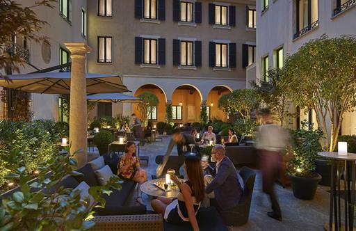 Mandarin Oriental Hotel Milan - Dining in the courtyard at dusk